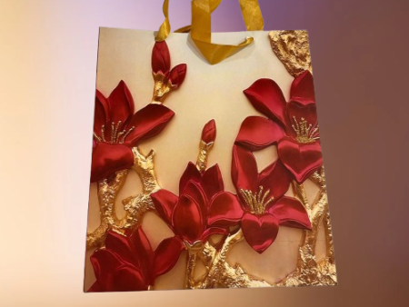 Luxury Floral Gift Bag with Red Embossed Flowers and Golden Handles